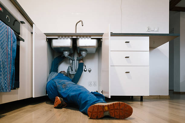 Professional Emergency Plumber technician working in Hudson Falls, NY